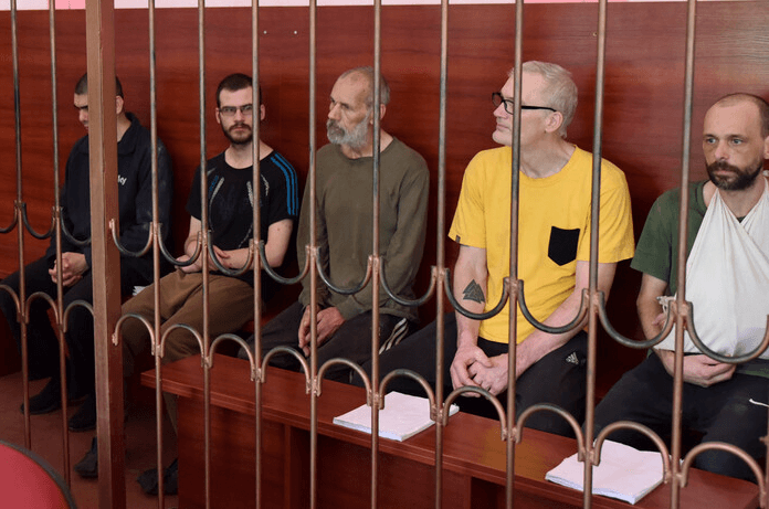 Векослав Пребег, Ділан Гілі, Джон Хардінг, Матіас Густавссон, Ендрю Гілл, 15 серпня 2022 року, Донецьк. Фото: ДАН